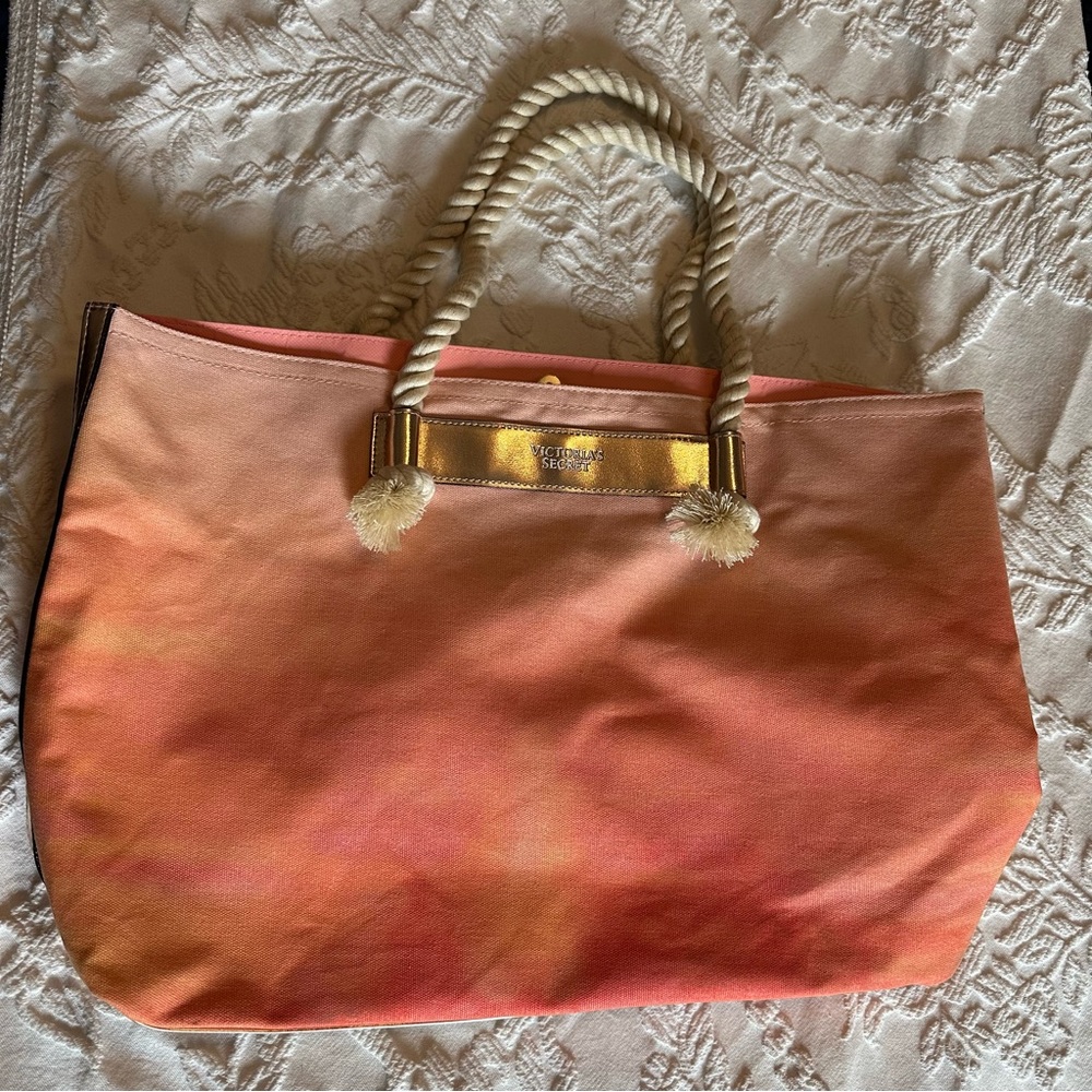 Beautiful coral/orange Victoria’s Secret tote bag!
